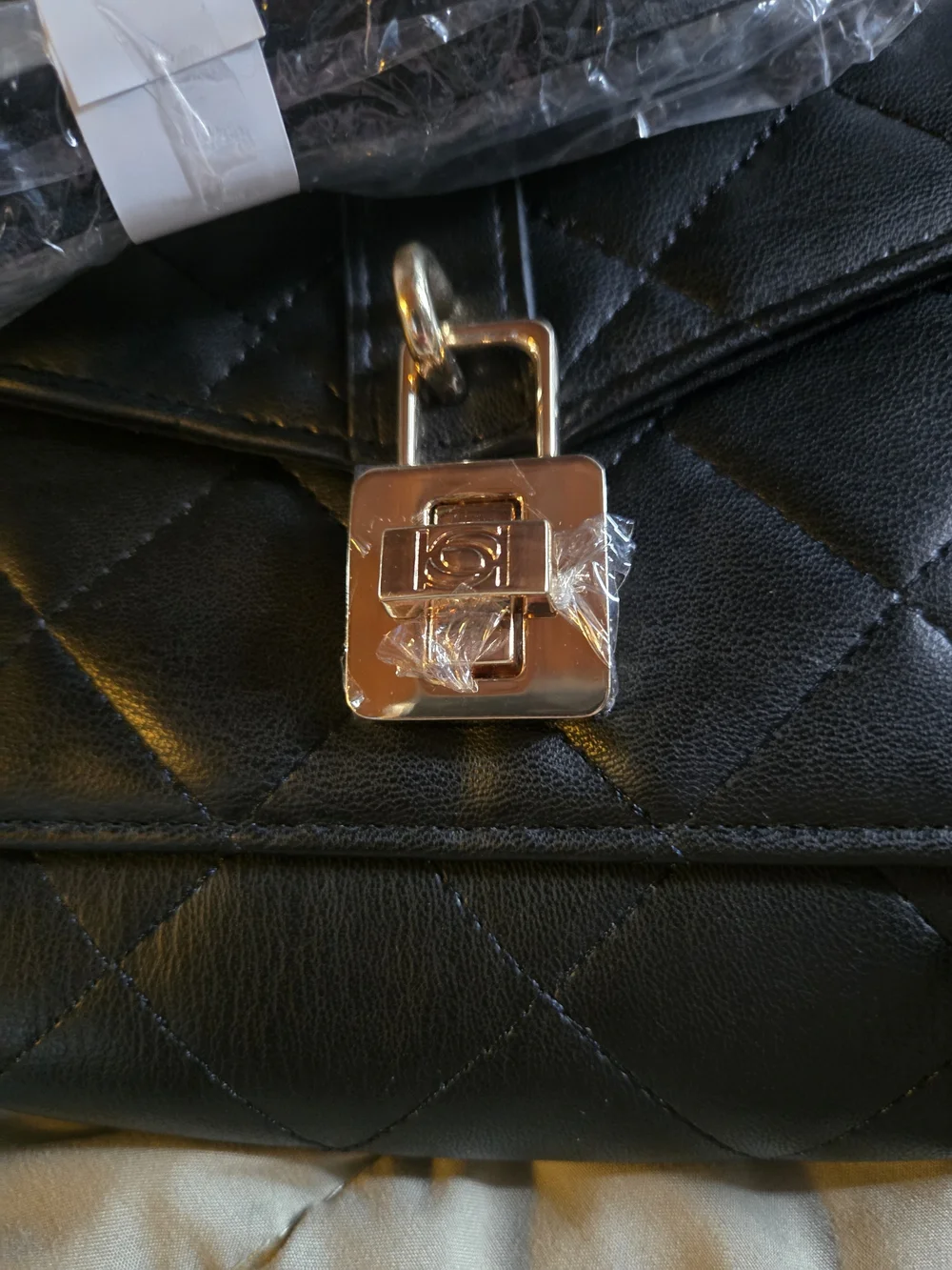 bebe Black Quilted Crossbody with Gold Lock Detail